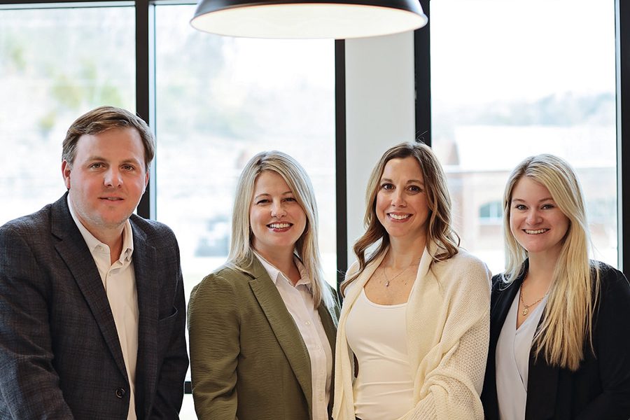Business Insurance - Boxwood Insurance Group Team Standing Together